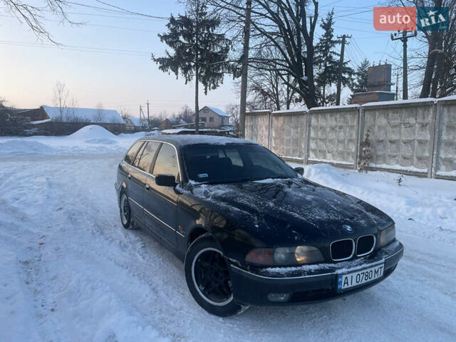 Чорний БМВ 5 Серія, об'ємом двигуна 2.5 л та пробігом 380 тис. км за 2799 $, фото 1 на Automoto.ua