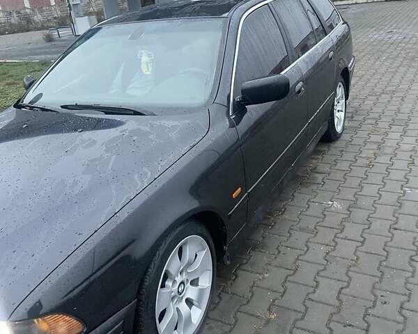 Черный БМВ 5 Серия, объемом двигателя 2.5 л и пробегом 380 тыс. км за 4499 $, фото 1 на Automoto.ua