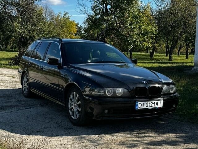 Черный БМВ 5 Серия, объемом двигателя 2.5 л и пробегом 400 тыс. км за 4950 $, фото 1 на Automoto.ua