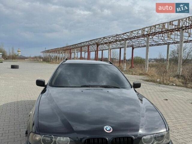 Черный БМВ 5 Серия, объемом двигателя 2.93 л и пробегом 500 тыс. км за 3999 $, фото 1 на Automoto.ua
