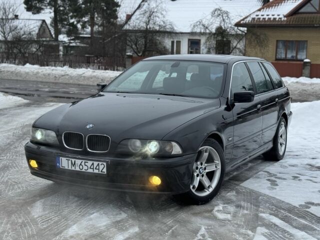 Черный БМВ 5 Серия, объемом двигателя 2.5 л и пробегом 319 тыс. км за 2550 $, фото 1 на Automoto.ua