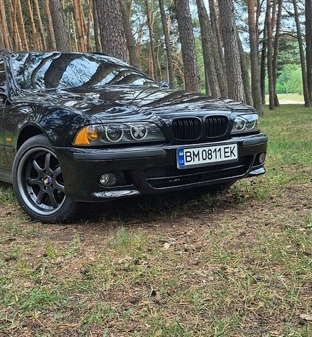 Черный БМВ 5 Серия, объемом двигателя 2.5 л и пробегом 425 тыс. км за 7000 $, фото 1 на Automoto.ua