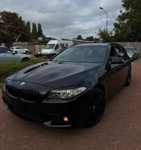 Черный БМВ 5 Серия, объемом двигателя 2 л и пробегом 300 тыс. км за 13500 $, фото 1 на Automoto.ua