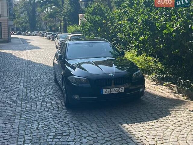 Черный БМВ 5 Серия, объемом двигателя 2 л и пробегом 219 тыс. км за 14046 $, фото 1 на Automoto.ua