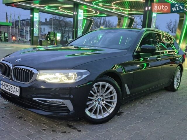 Черный БМВ 5 Серия, объемом двигателя 2 л и пробегом 138 тыс. км за 29200 $, фото 1 на Automoto.ua
