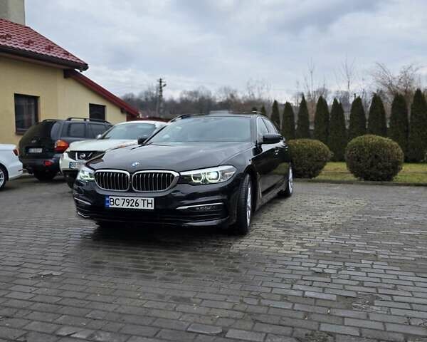 Черный БМВ 5 Серия, объемом двигателя 2 л и пробегом 208 тыс. км за 27000 $, фото 1 на Automoto.ua