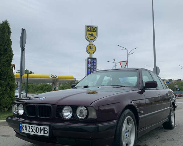 Фиолетовый БМВ 5 Серия, объемом двигателя 1.8 л и пробегом 500 тыс. км за 2900 $, фото 1 на Automoto.ua