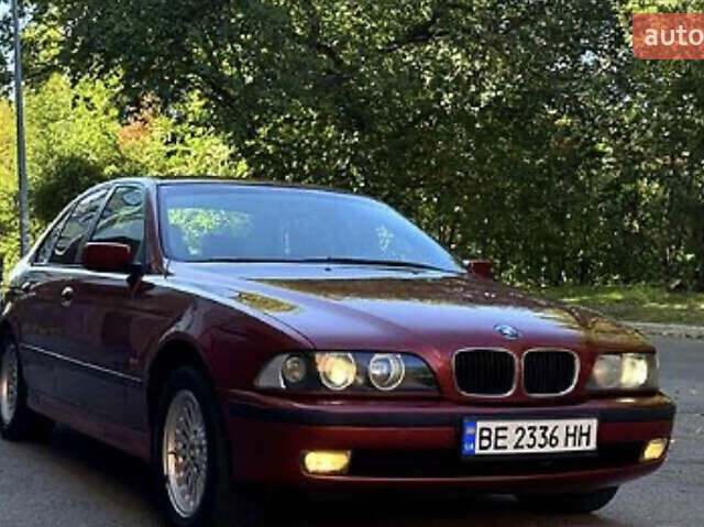 Красный БМВ 5 Серия, объемом двигателя 2 л и пробегом 325 тыс. км за 5000 $, фото 1 на Automoto.ua