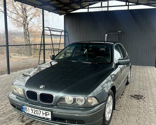 Серый БМВ 5 Серия, объемом двигателя 2.5 л и пробегом 323 тыс. км за 5200 $, фото 1 на Automoto.ua