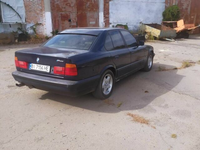 Синий БМВ 5 Серия, объемом двигателя 1.8 л и пробегом 1000 тыс. км за 3000 $, фото 1 на Automoto.ua