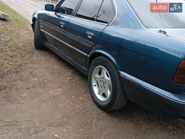 Синий БМВ 5 Серия, объемом двигателя 1.8 л и пробегом 420 тыс. км за 2800 $, фото 1 на Automoto.ua