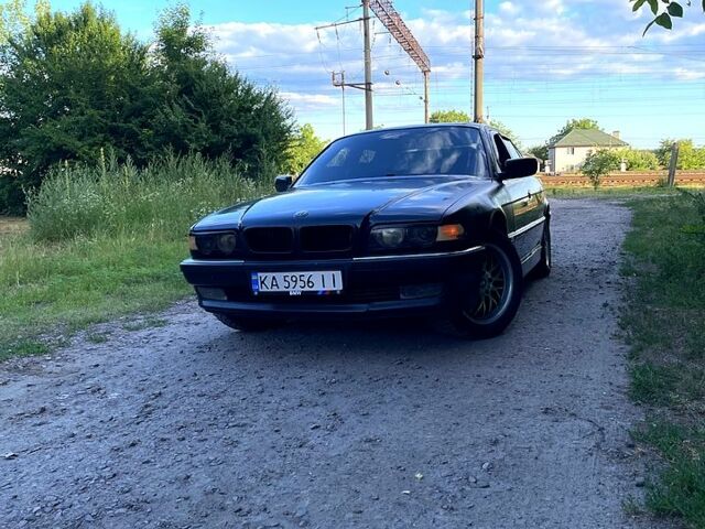 Синий БМВ 5 Серия, объемом двигателя 4.4 л и пробегом 450 тыс. км за 4000 $, фото 1 на Automoto.ua