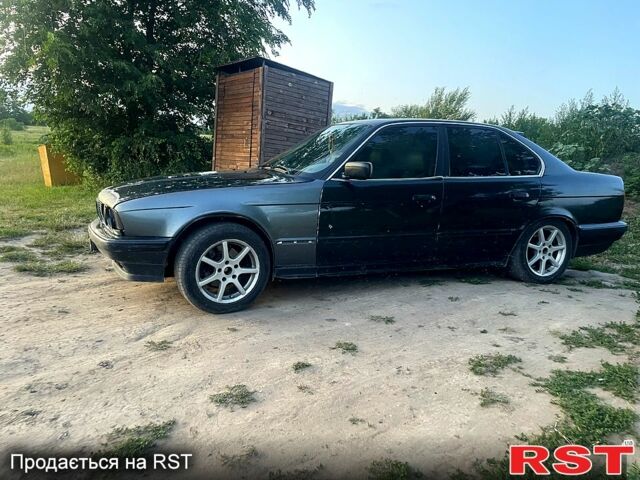 Зеленый БМВ 5 Серия, объемом двигателя 2 л и пробегом 301 тыс. км за 2000 $, фото 1 на Automoto.ua