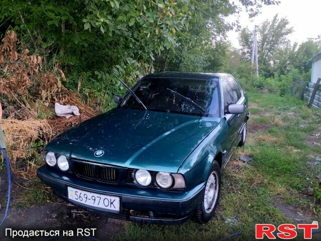 Зеленый БМВ 5 Серия, объемом двигателя 2.5 л и пробегом 300 тыс. км за 1499 $, фото 1 на Automoto.ua