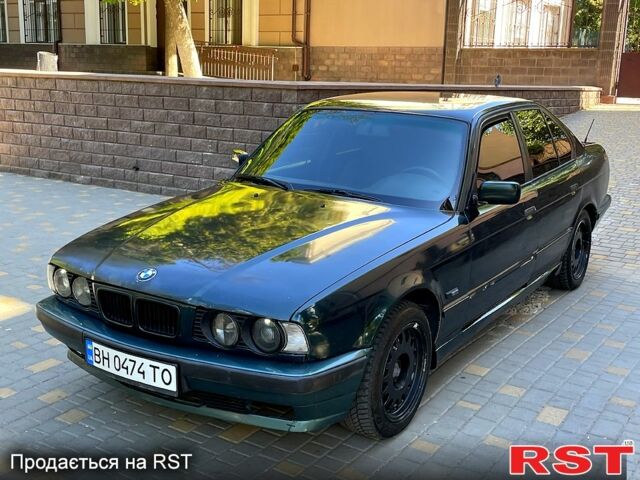 Зеленый БМВ 5 Серия, объемом двигателя 2 л и пробегом 350 тыс. км за 1950 $, фото 1 на Automoto.ua