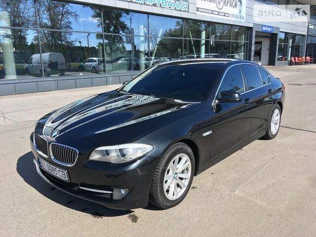 Чорний БМВ 520, об'ємом двигуна 2 л та пробігом 170 тис. км за 18500 $, фото 1 на Automoto.ua