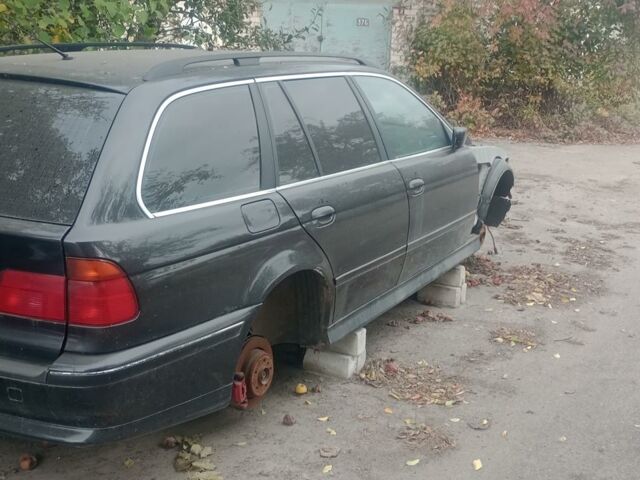 Черный БМВ 520, объемом двигателя 2 л и пробегом 300 тыс. км за 1000 $, фото 1 на Automoto.ua