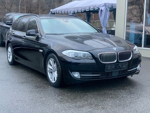 Черный БМВ 520, объемом двигателя 2 л и пробегом 182 тыс. км за 17900 $, фото 1 на Automoto.ua