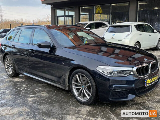 Черный БМВ 520, объемом двигателя 2 л и пробегом 143 тыс. км за 26600 $, фото 1 на Automoto.ua