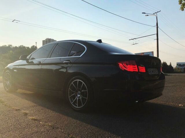 Серый БМВ 520, объемом двигателя 2 л и пробегом 95 тыс. км за 25000 $, фото 1 на Automoto.ua
