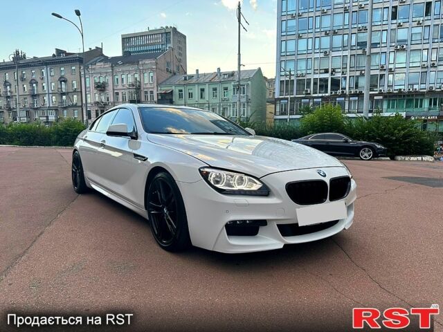 Белый БМВ 6 Серия, объемом двигателя 3 л и пробегом 150 тыс. км за 25000 $, фото 1 на Automoto.ua