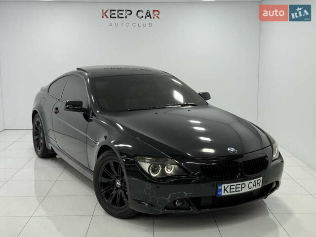 Черный БМВ 6 Серия, объемом двигателя 4.4 л и пробегом 130 тыс. км за 11000 $, фото 1 на Automoto.ua
