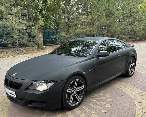 Черный БМВ 6 Серия, объемом двигателя 4.4 л и пробегом 144 тыс. км за 8500 $, фото 1 на Automoto.ua