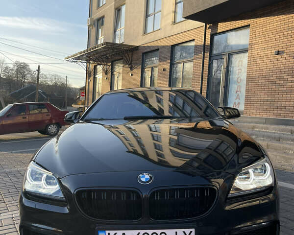 Черный БМВ 6 Серия, объемом двигателя 2.99 л и пробегом 83 тыс. км за 26500 $, фото 1 на Automoto.ua