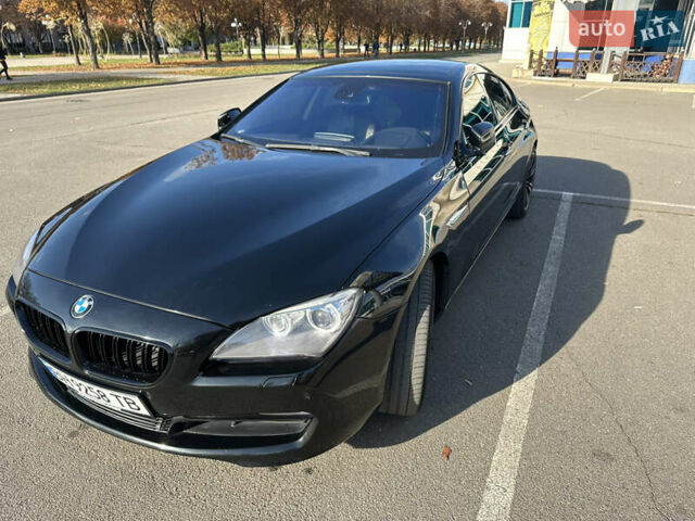 Черный БМВ 6 Серия, объемом двигателя 2.98 л и пробегом 170 тыс. км за 16500 $, фото 1 на Automoto.ua