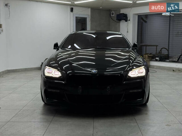 Черный БМВ 6 Серия, объемом двигателя 2.98 л и пробегом 153 тыс. км за 19999 $, фото 1 на Automoto.ua