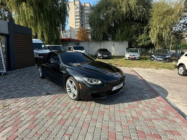 Черный БМВ 6 Серия, объемом двигателя 4.4 л и пробегом 156 тыс. км за 25500 $, фото 1 на Automoto.ua