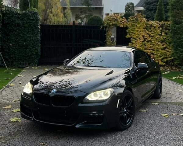 Черный БМВ 6 Серия, объемом двигателя 3 л и пробегом 114 тыс. км за 26500 $, фото 1 на Automoto.ua