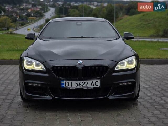 Черный БМВ 6 Серия, объемом двигателя 4.4 л и пробегом 147 тыс. км за 27999 $, фото 1 на Automoto.ua