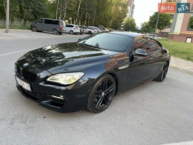 Черный БМВ 6 Серия, объемом двигателя 4.4 л и пробегом 147 тыс. км за 29500 $, фото 1 на Automoto.ua