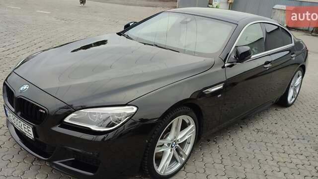 Черный БМВ 6 Серия, объемом двигателя 2.99 л и пробегом 160 тыс. км за 30000 $, фото 1 на Automoto.ua