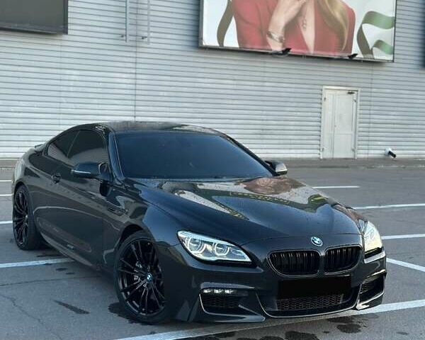Черный БМВ 6 Серия, объемом двигателя 2.98 л и пробегом 170 тыс. км за 25000 $, фото 1 на Automoto.ua