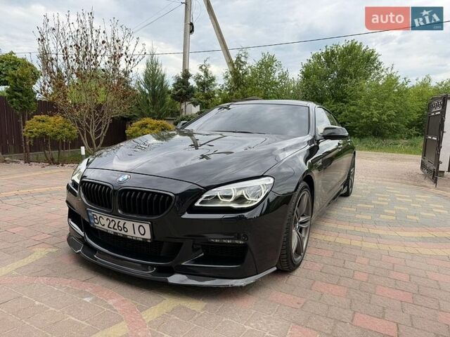 Черный БМВ 6 Серия, объемом двигателя 2.98 л и пробегом 124 тыс. км за 28700 $, фото 1 на Automoto.ua