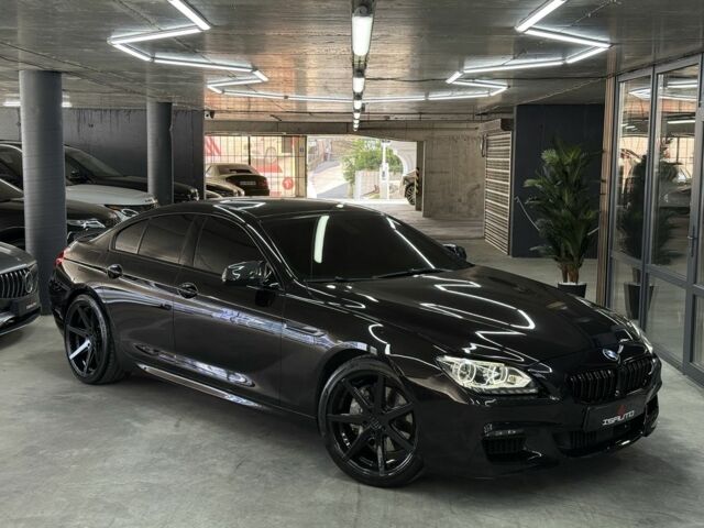 Черный БМВ 6 Серия, объемом двигателя 4.4 л и пробегом 53 тыс. км за 24000 $, фото 1 на Automoto.ua