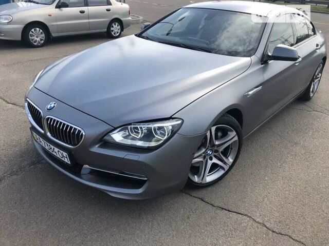 Серый БМВ 6 Серия, объемом двигателя 3 л и пробегом 230 тыс. км за 28000 $, фото 1 на Automoto.ua