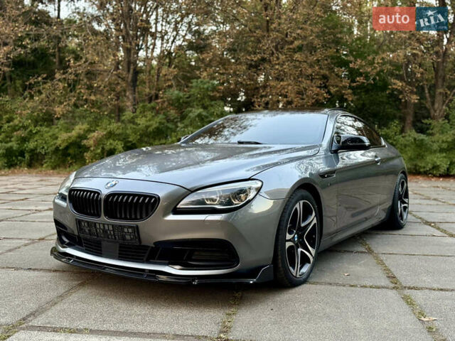 Серый БМВ 6 Серия, объемом двигателя 3 л и пробегом 170 тыс. км за 32000 $, фото 1 на Automoto.ua