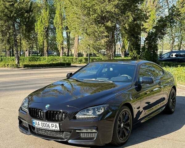 Синий БМВ 6 Серия, объемом двигателя 2.98 л и пробегом 76 тыс. км за 28900 $, фото 1 на Automoto.ua