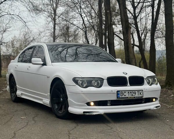 Белый БМВ 7 Серия, объемом двигателя 3.6 л и пробегом 241 тыс. км за 7000 $, фото 1 на Automoto.ua