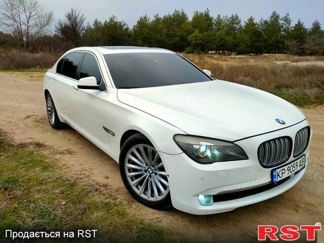 Белый БМВ 7 Серия, объемом двигателя 3 л и пробегом 223 тыс. км за 10400 $, фото 1 на Automoto.ua