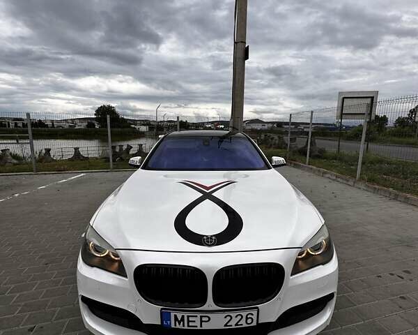 Белый БМВ 7 Серия, объемом двигателя 2.99 л и пробегом 380 тыс. км за 12000 $, фото 1 на Automoto.ua