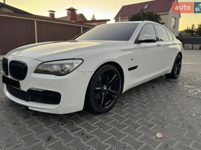 Белый БМВ 7 Серия, объемом двигателя 2.98 л и пробегом 124 тыс. км за 15500 $, фото 1 на Automoto.ua