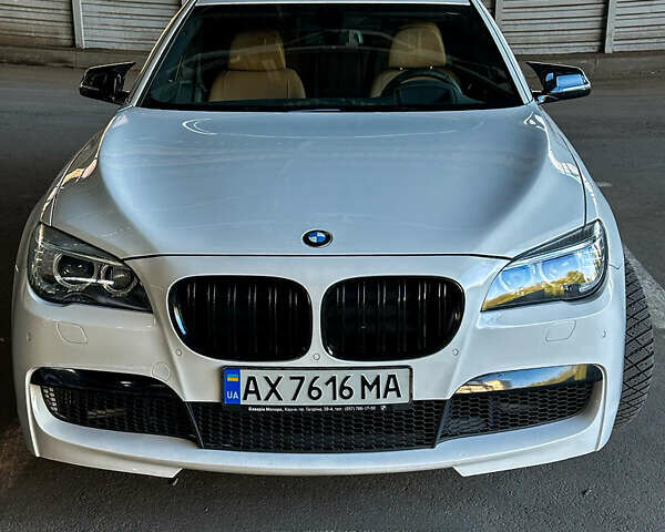 Білий БМВ 7 Серія, об'ємом двигуна 3 л та пробігом 220 тис. км за 15900 $, фото 1 на Automoto.ua