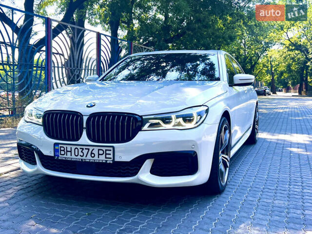 Белый БМВ 7 Серия, объемом двигателя 3 л и пробегом 158 тыс. км за 31500 $, фото 1 на Automoto.ua