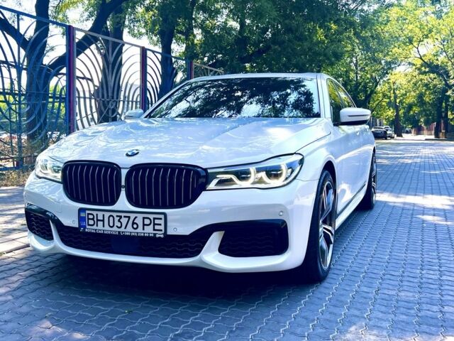 Белый БМВ 7 Серия, объемом двигателя 3 л и пробегом 158 тыс. км за 29700 $, фото 1 на Automoto.ua