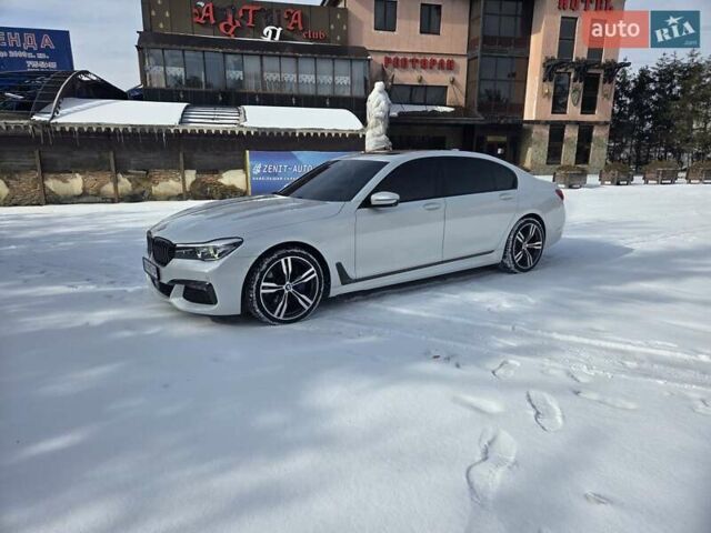 Белый БМВ 7 Серия, объемом двигателя 3 л и пробегом 103 тыс. км за 35000 $, фото 1 на Automoto.ua