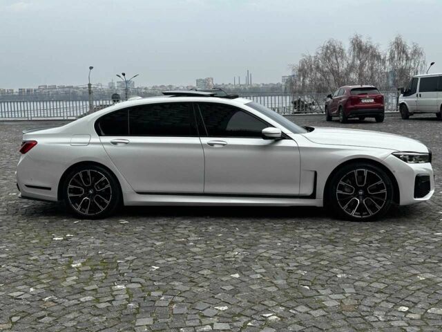 Белый БМВ 7 Серия, объемом двигателя 4.4 л и пробегом 153 тыс. км за 29000 $, фото 1 на Automoto.ua